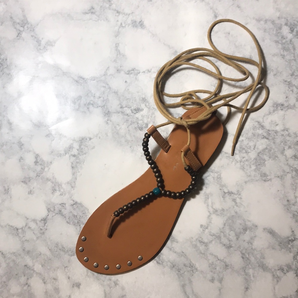 Women tie up sandal
